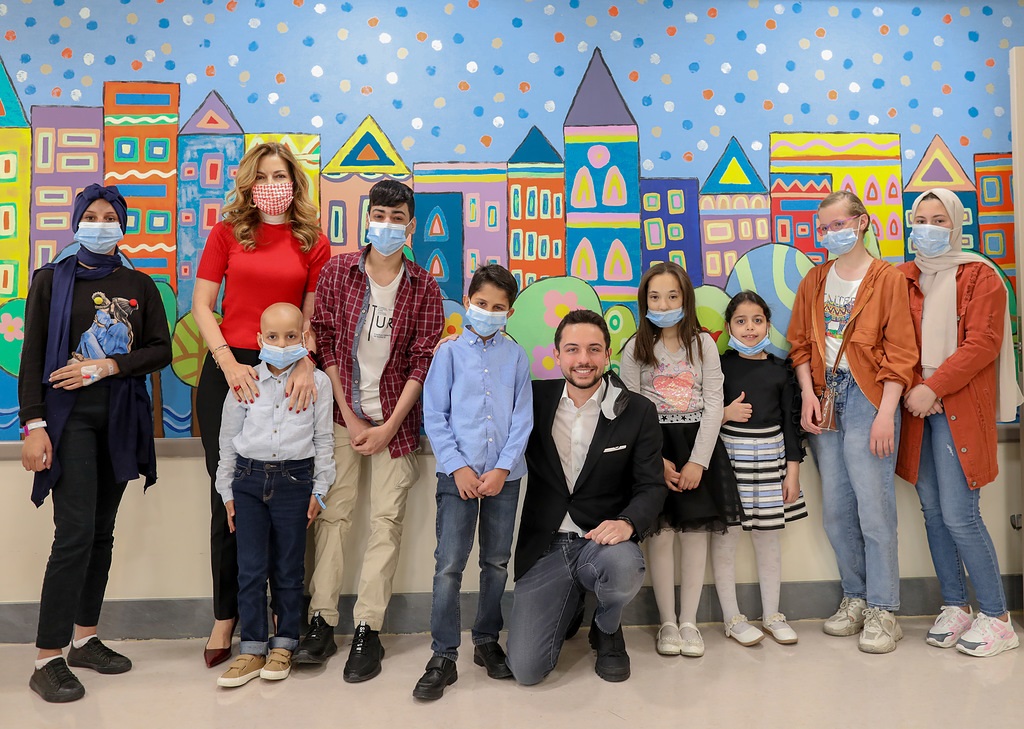 HRH Crown Prince Hussein poses for a group photo during a visit to the King Hussein Cancer Centre  on Tuesday (Photo courtesy of Royal Court)